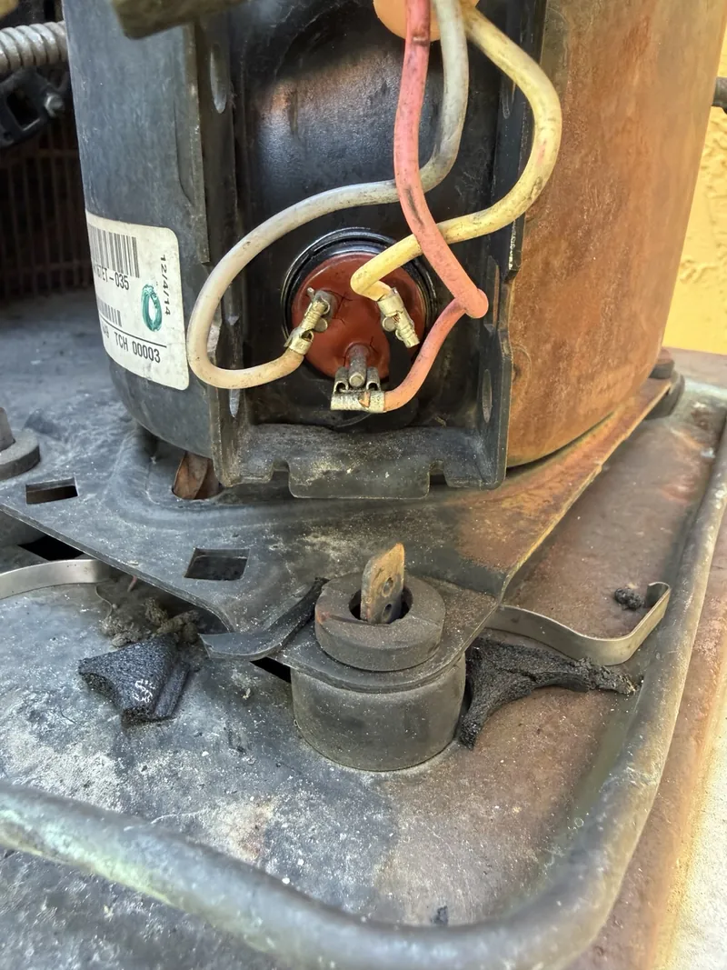 Close-up of the original walk-in cooler compressor terminals at Francesca's Pizza